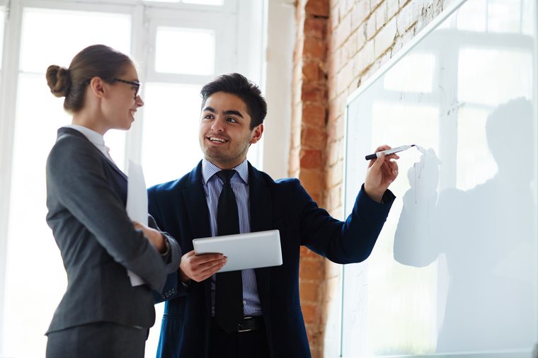 Teacher explaining a plan to students